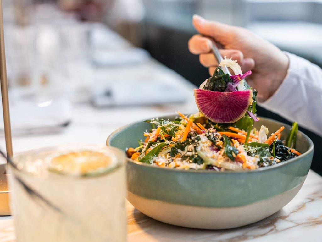 close up shot of the avocado kale salad